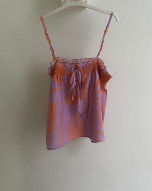 Blusa de tirantes finos con estampado botánico naranja y morado