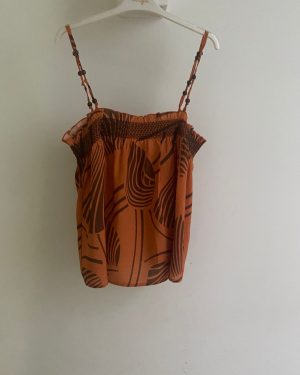 Blusa de tirantes finos con estampado botánico naranja y marrón