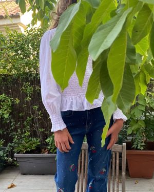 Jeans denim con bordado (4-14 años)